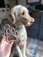 Load image into Gallery viewer, Paw Print Gingerbread Themed Ornament
